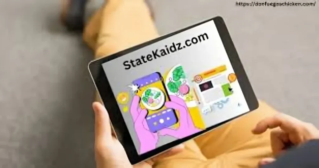 A person holding a tablet displaying a webpage with "StateKaidz.com" at the top, showing colorful digital illustrations of food and online content, while lounging with their legs in beige pants visible in the background.