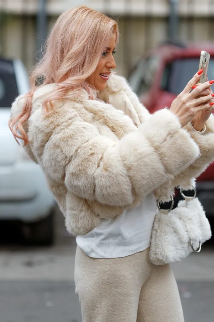 woman taking picture for dating profile